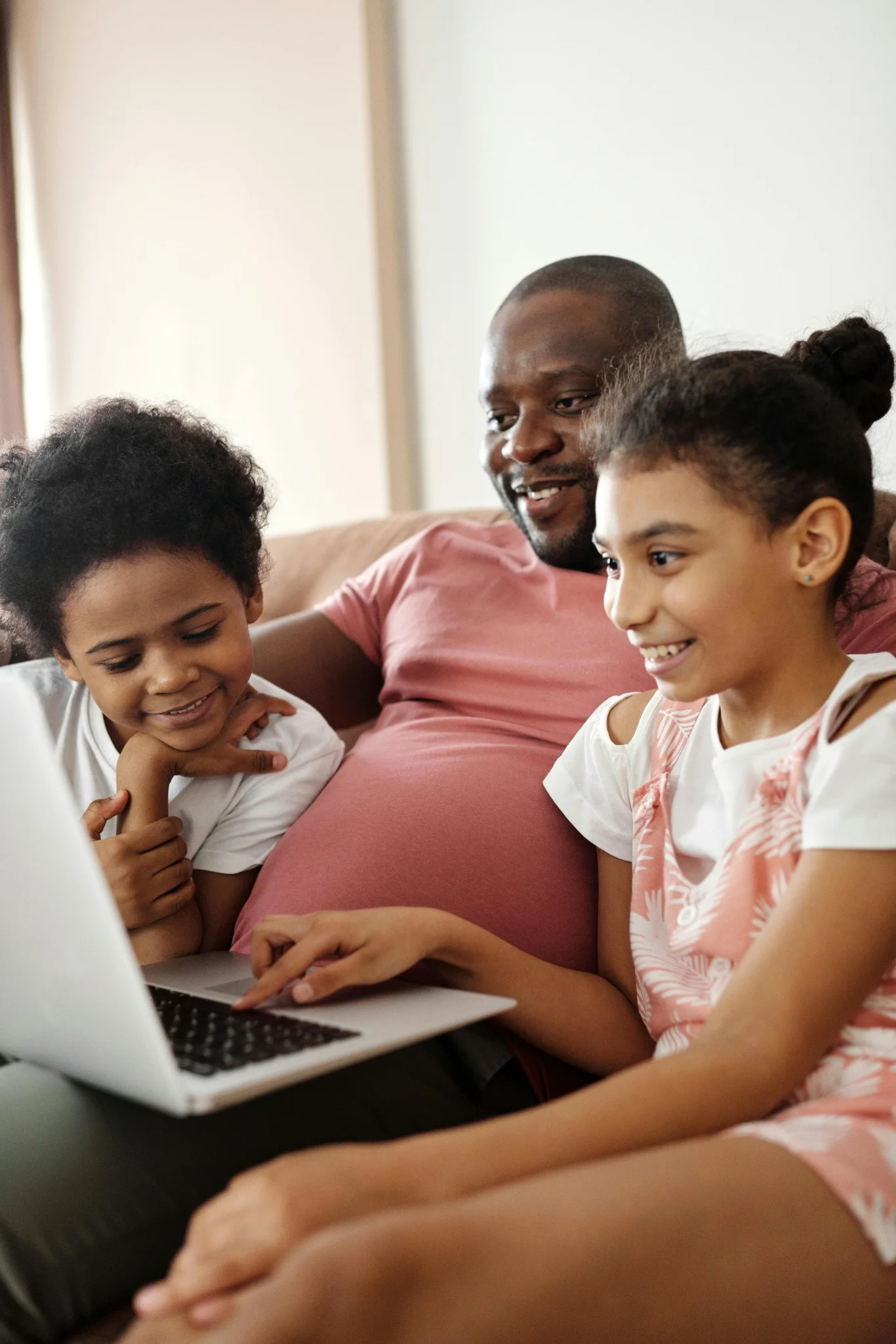Happy family using CTL internet in Jamaica